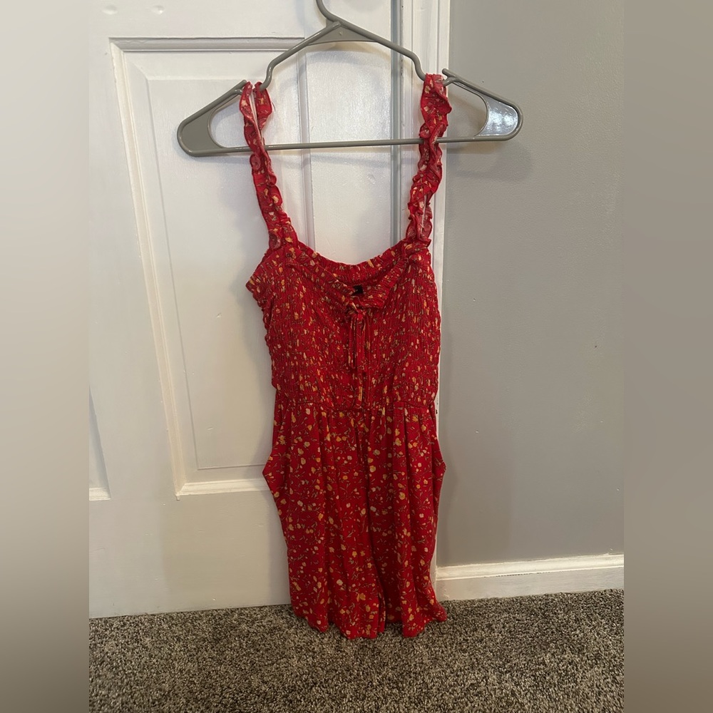 Lily Rose Romper Hot pink with yellow/green rose detail and pockets size XS